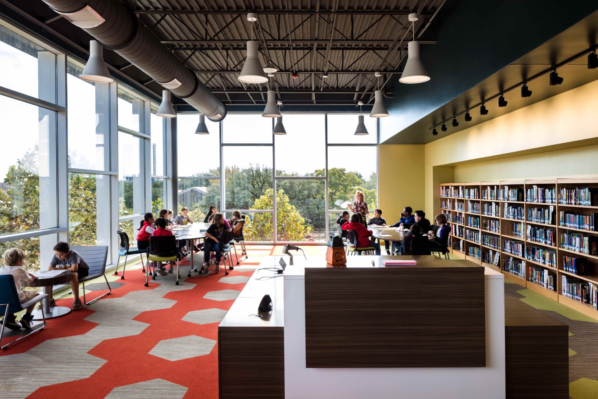 Wilson Montessori School in Houston ISD gets an update and 3-story addition to an historical building on a tiny neighborhood site with an emphasis on bringing the outdoors in.