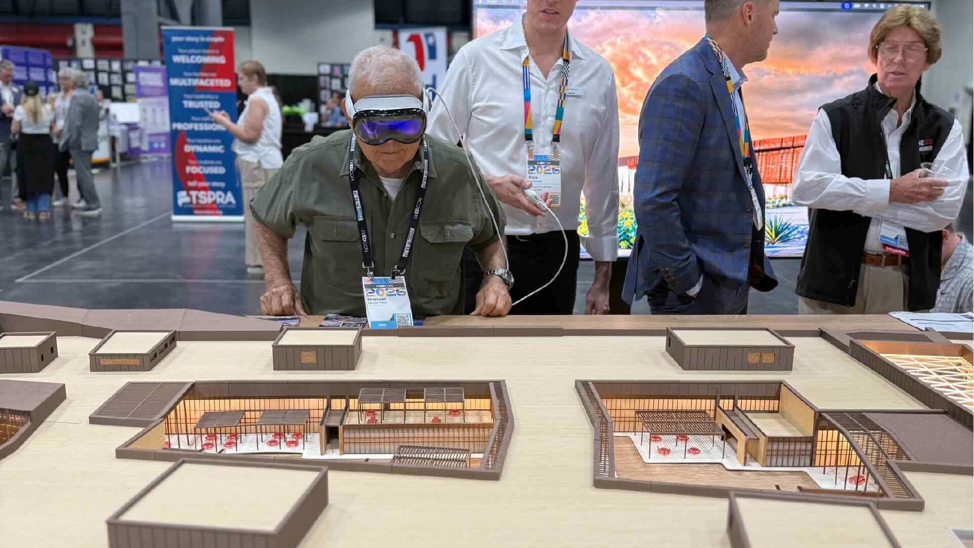 Man looking at model with VR Goggles